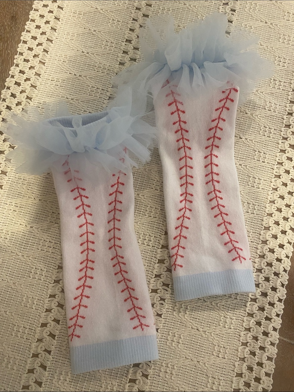 Baby tutu baseball leg warmers.  The cutest. Never worn.